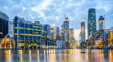 London, Canary Wharf at sunset. Banking and business part of London with skyscrapers.