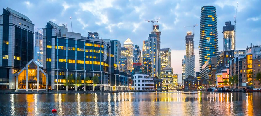 London, Canary Wharf at sunset. Banking and business part of London with skyscrapers.