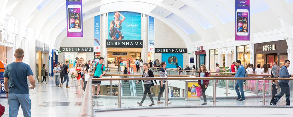 People walking in shopping center