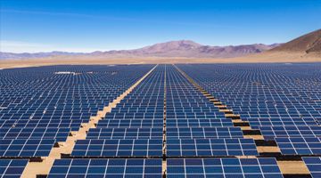 Aerial view of hundreds solar energy modules or panels