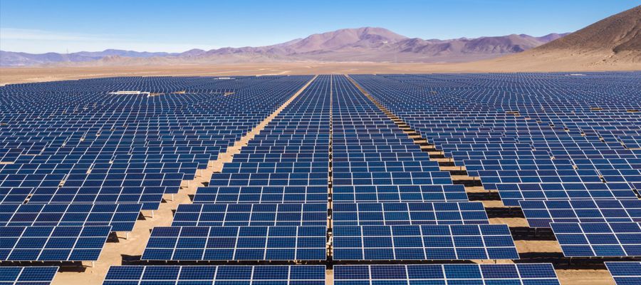 Aerial view of hundreds solar energy modules or panels