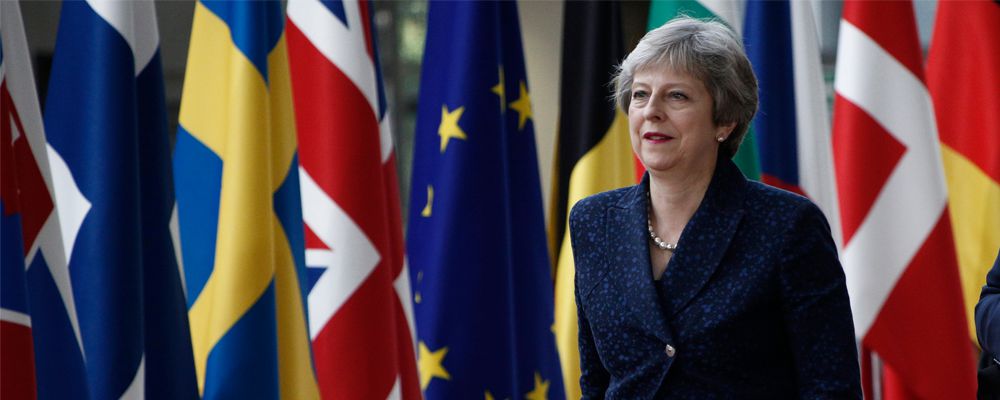 Theresa May arrives for a meeting with European Union leaders