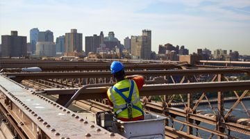 US Construction worker on Brooklyn Bridge