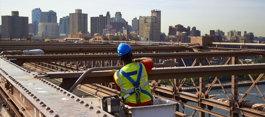 US Construction worker on Brooklyn Bridge